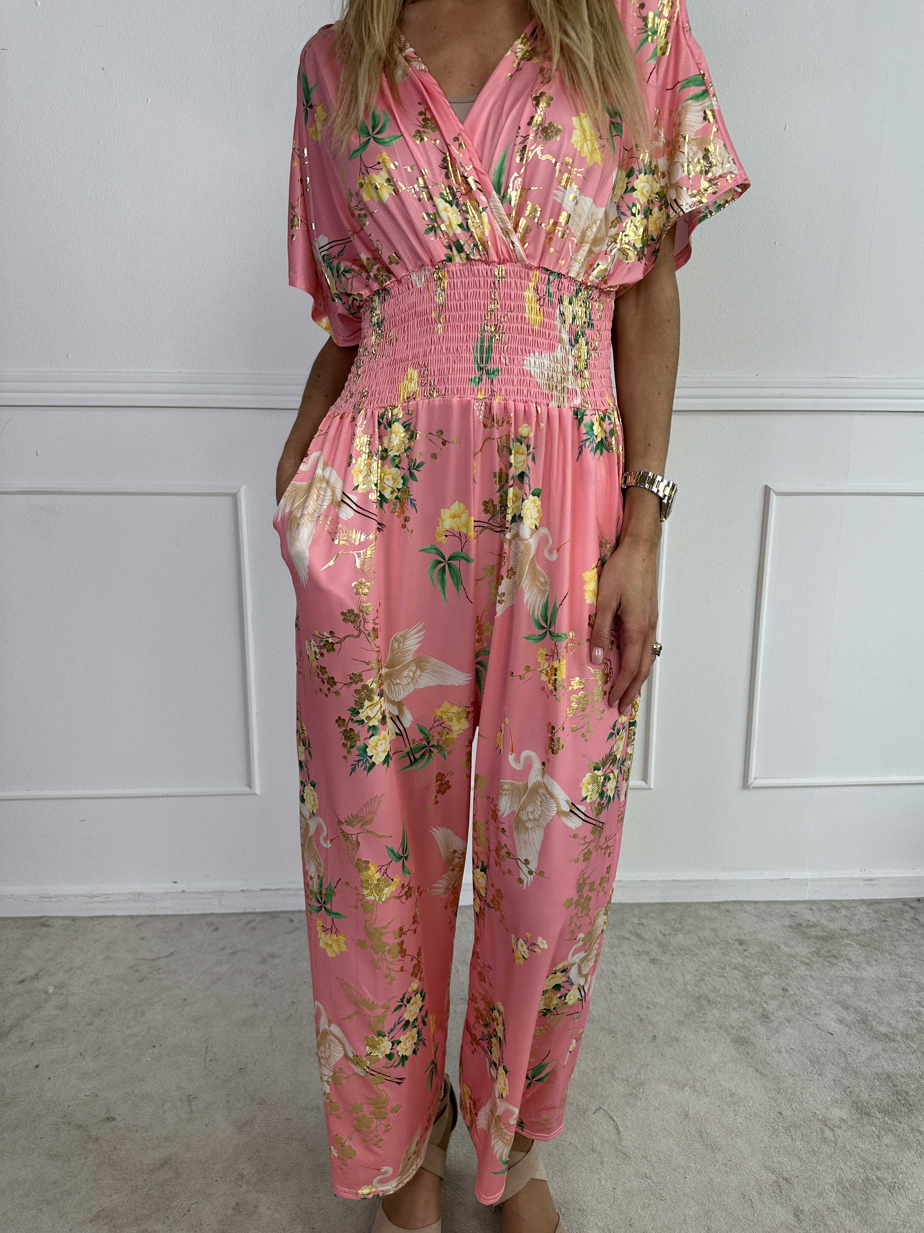 Pams Fly Jumpsuit - Elastisk buksedragt med blomster- og fugleprint